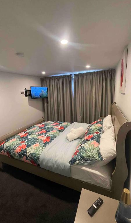 Postel nebo postele na pokoji v ubytování Tiny Home in Mosgiel