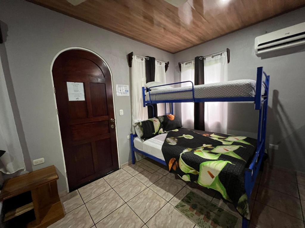 Postel nebo postele na pokoji v ubytování Apartamentos Mansión Tropical