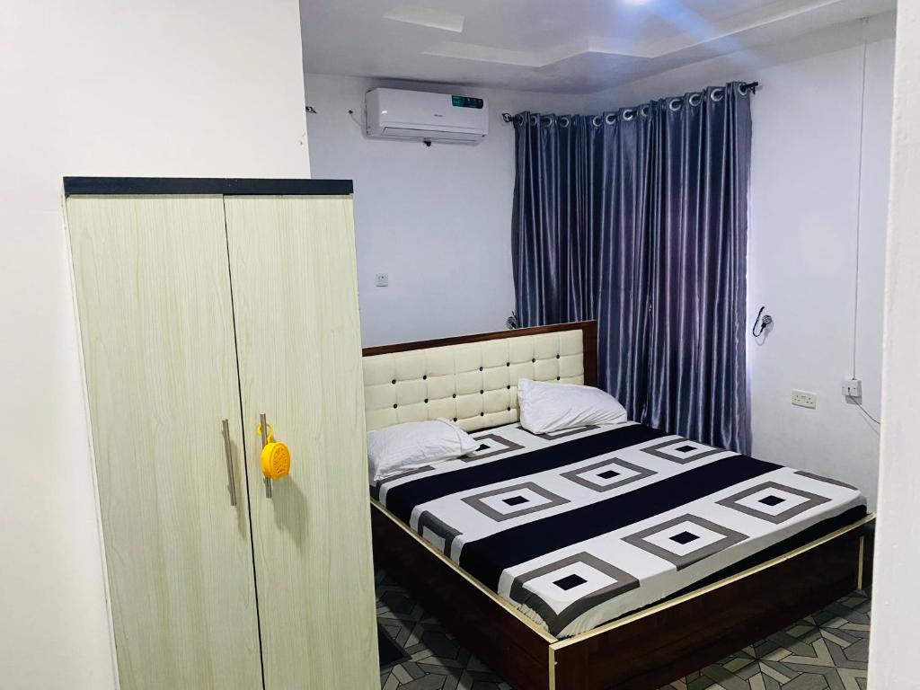 Postel nebo postele na pokoji v ubytování Olatis hotel