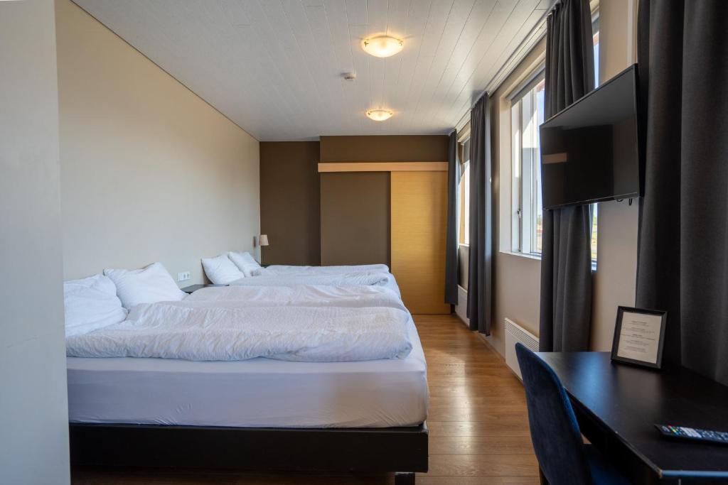 Voodi või voodid majutusasutuse Hotel Post toas