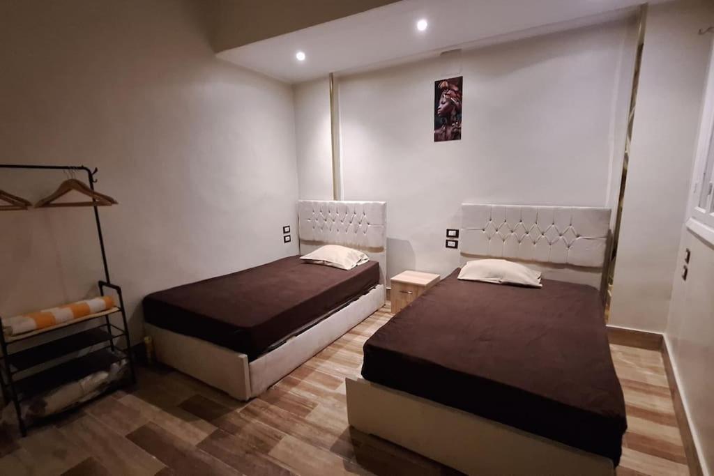 Postel nebo postele na pokoji v ubytování Grand Duplex