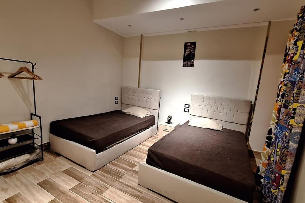 Postel nebo postele na pokoji v ubytování Grand Duplex