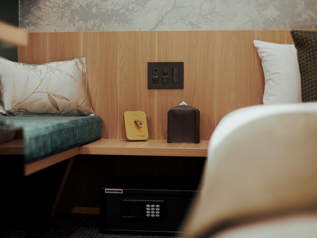 R Hotel Namba Daikokuchoにあるベッド