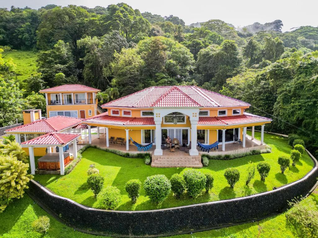 an aerial view of a house with a garden at Luxe - 5 Lakeview Villas - Weddings - Retreats - AC - Pool - Hot Tub - Sleeps 25 in Aguacate