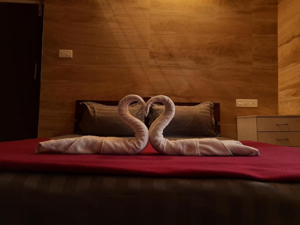 Postel nebo postele na pokoji v ubytování Green Palace Resort