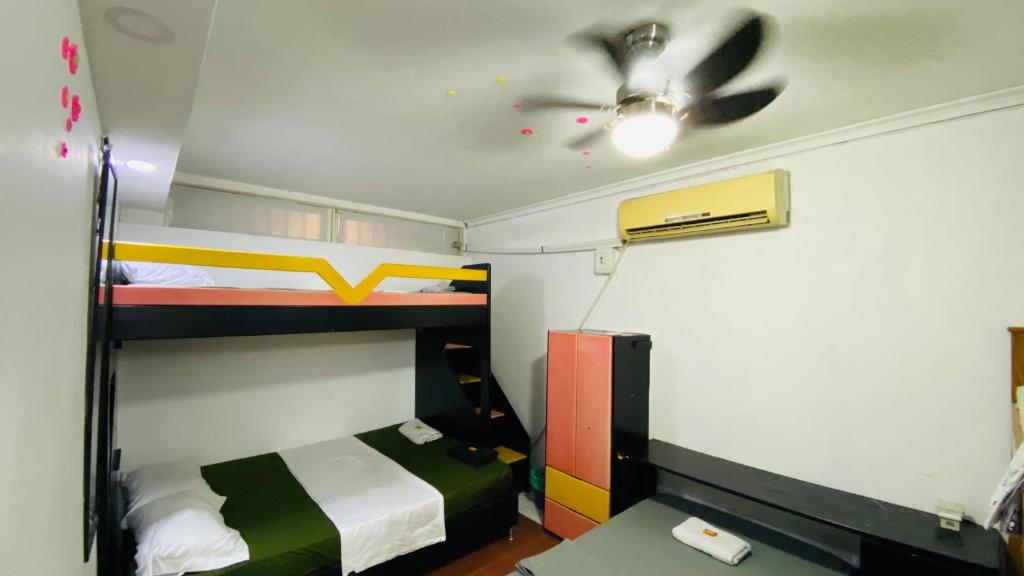 Voodi või voodid majutusasutuse Casa Feliz Hostal toas