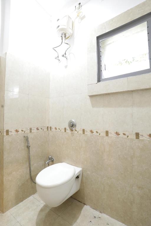 Koupelna v ubytování Hi5 Hotel Aryan