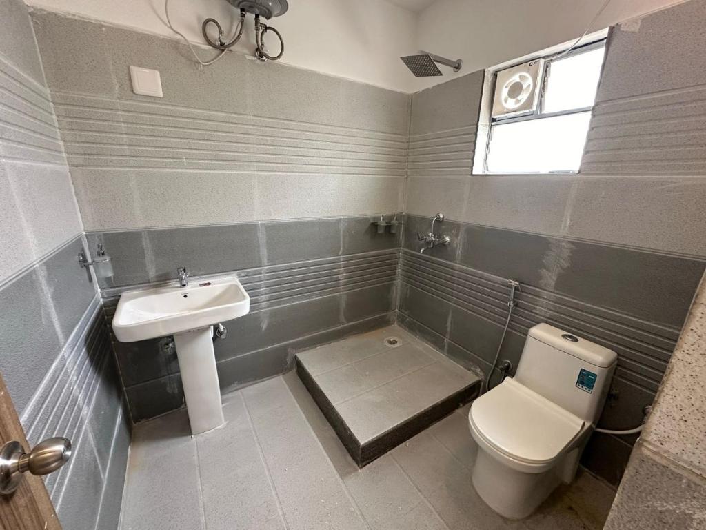 Koupelna v ubytování Hi5 Hotel Aryan