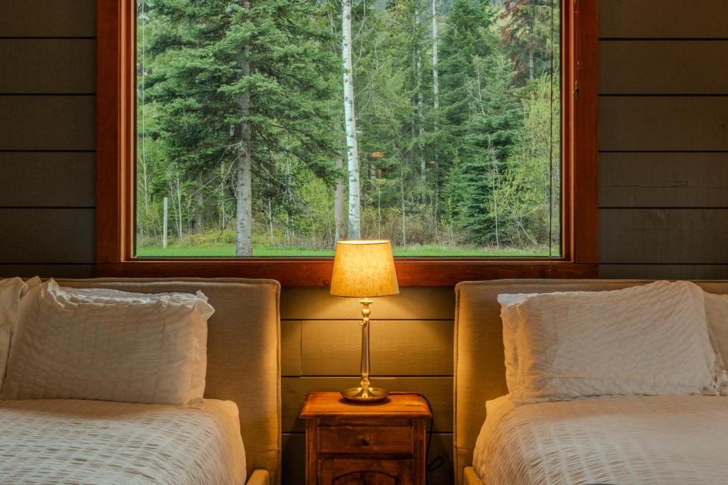 Postel nebo postele na pokoji v ubytování Winston Lodge