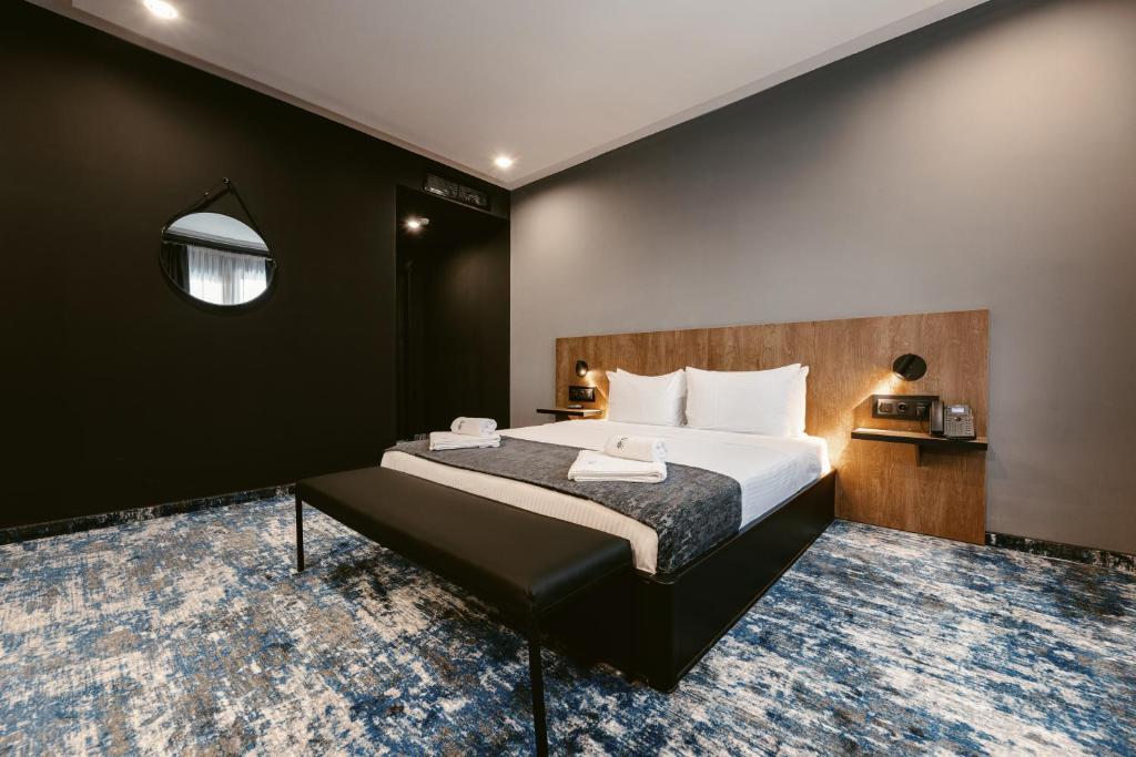Postel nebo postele na pokoji v ubytování Hotel Splendid Tbilisi