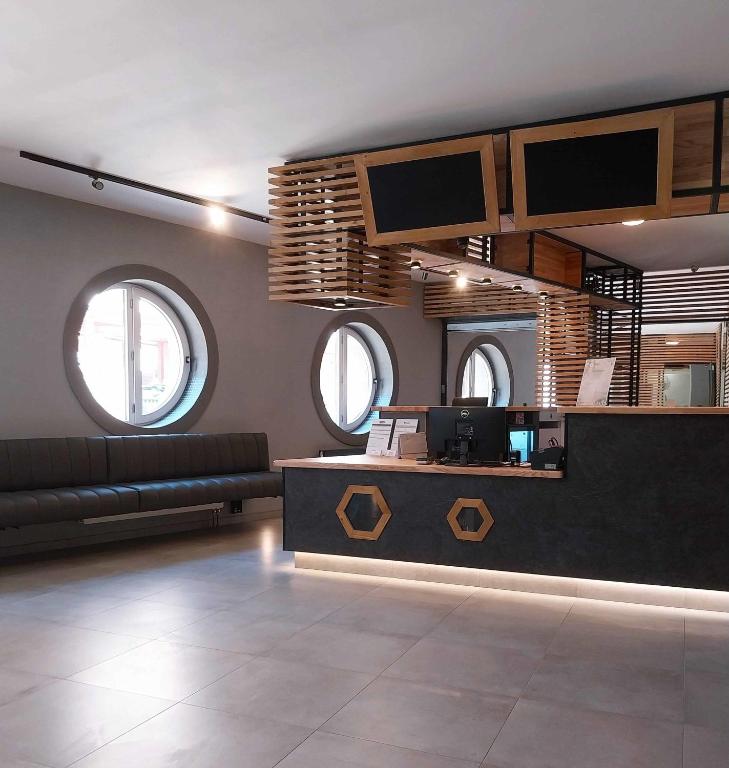 Kuchyň nebo kuchyňský kout v ubytování Hotel Fabrica