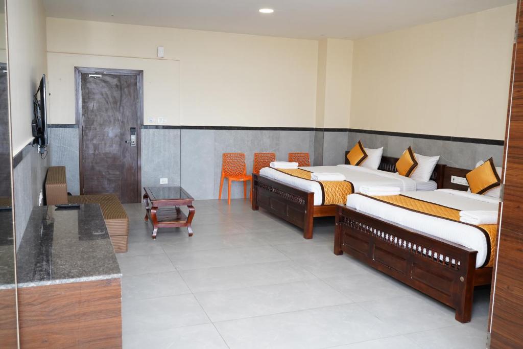 Postel nebo postele na pokoji v ubytování Ketti Heights Resorts