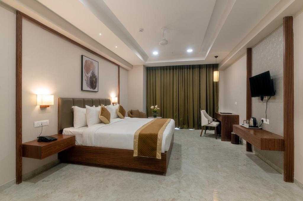 Giường trong phòng chung tại VITS Satyajeet Karad