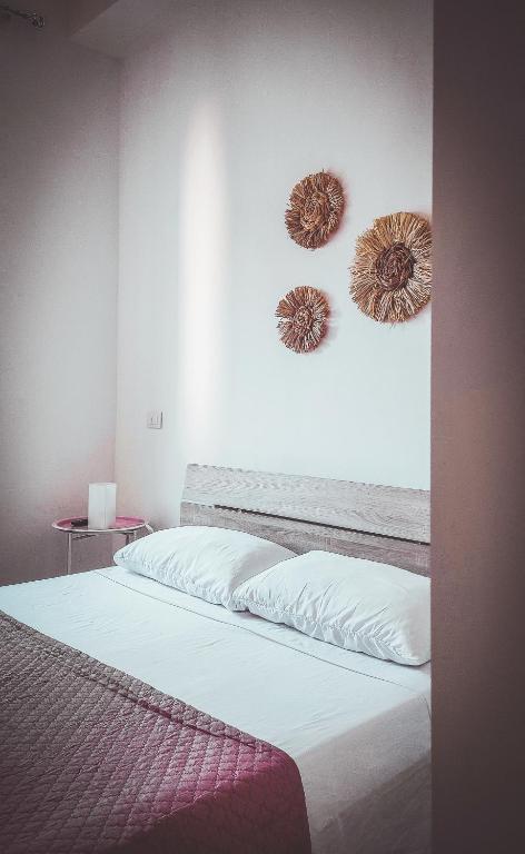 Postel nebo postele na pokoji v ubytování Lecce d'amare - 3 rooms