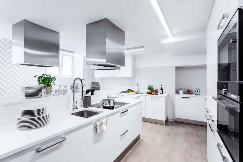 A cozinha ou kitchenette de VISIONAPARTMENTS Vevey - contactless check-in