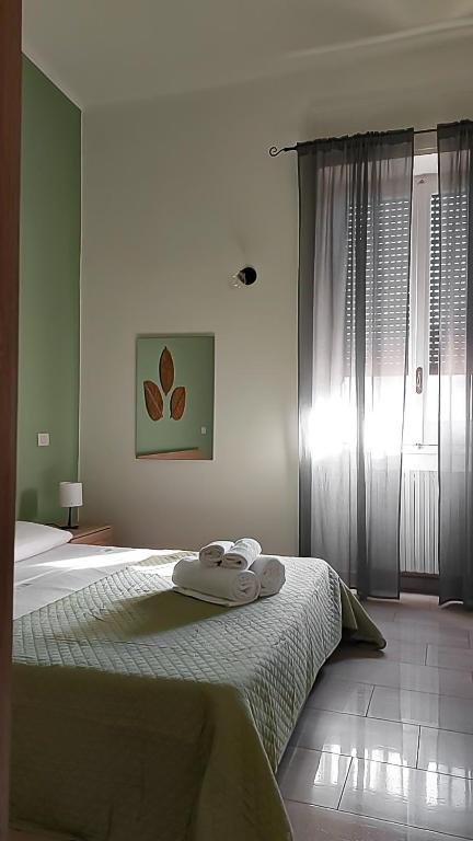 Postel nebo postele na pokoji v ubytování Lecce d'amare - 3 rooms