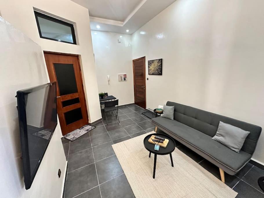 Ruang duduk di Loft cosy RdC Mermoz Keur Gorgui - Wifi HD - DPL0