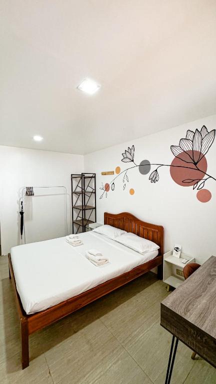Kasamigos Guesthouse with Fast Internetにあるベッド