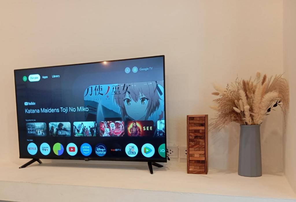 TV a/nebo společenská místnost v ubytování Crocus Garden