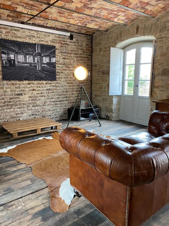 Posezení v ubytování Secret d'Uzès - Le Loft - Avec piscine chauffée
