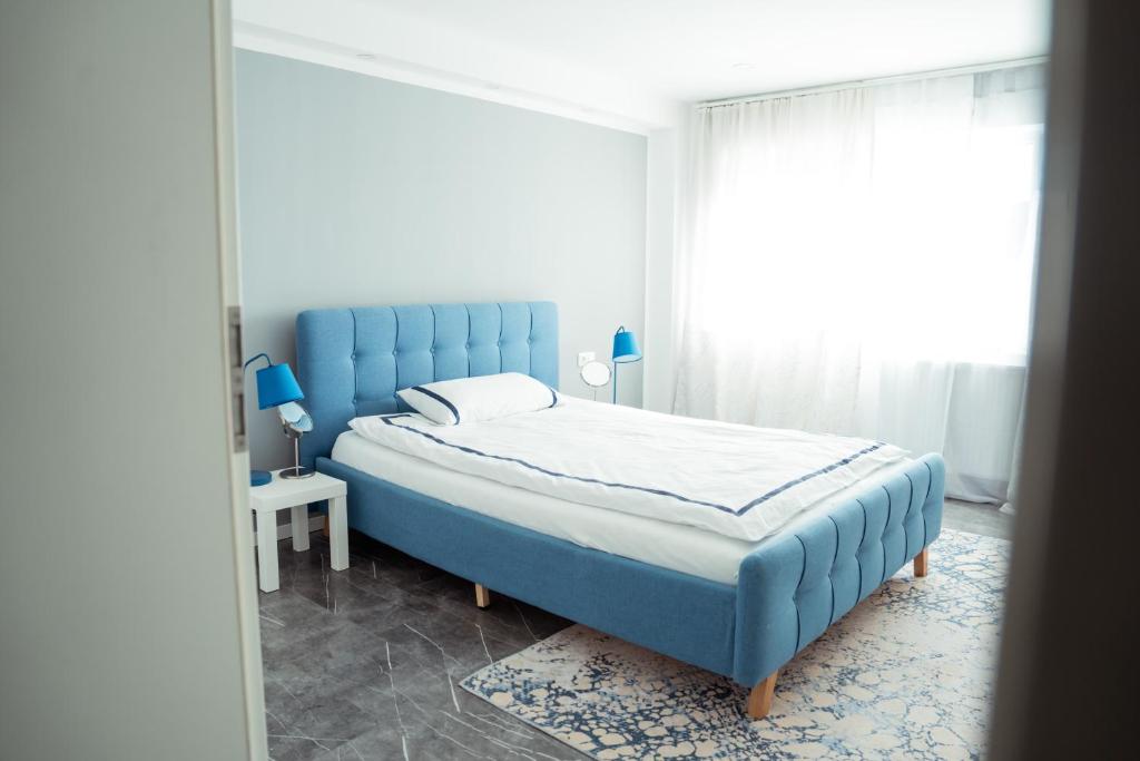 Katil atau katil-katil dalam bilik di Ferienhaus - Ruheoase Kassel