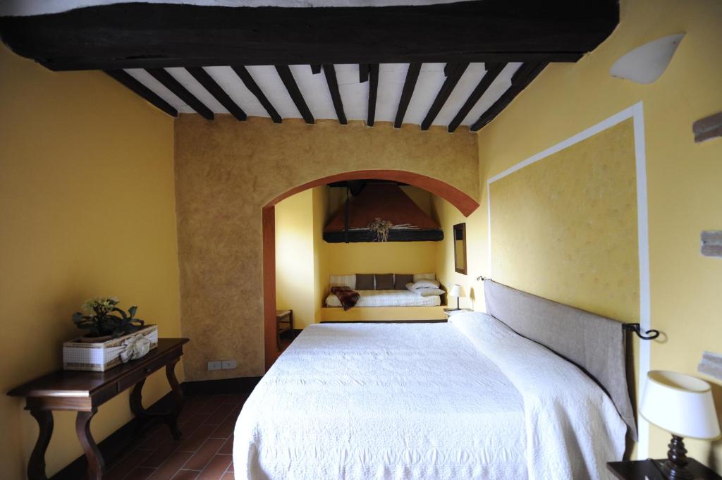 Posteľ alebo postele v izbe v ubytovaní Fattoria Agriturismo Nerbona