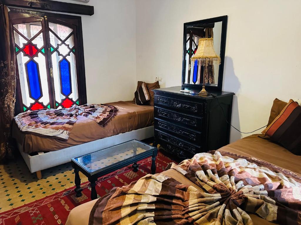 Postel nebo postele na pokoji v ubytování Riad Salma Restaurant Spa