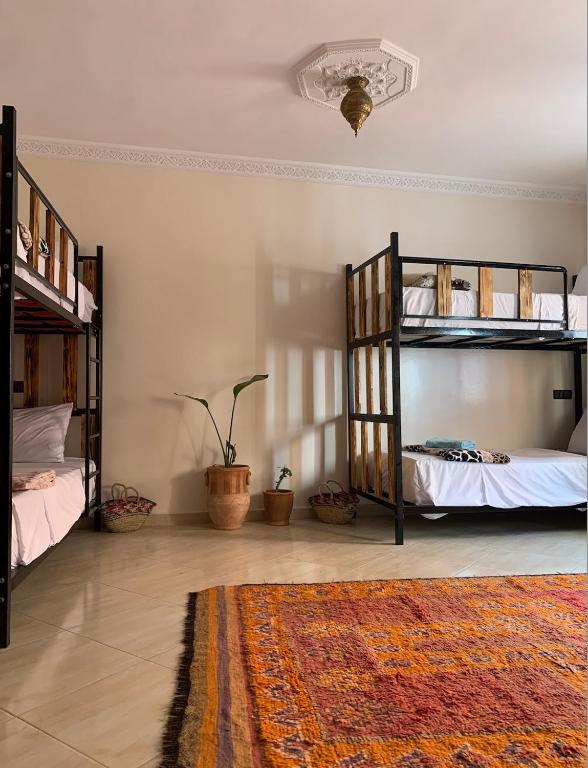 Postel nebo postele na pokoji v ubytování CHILL SURFER HOSTEL