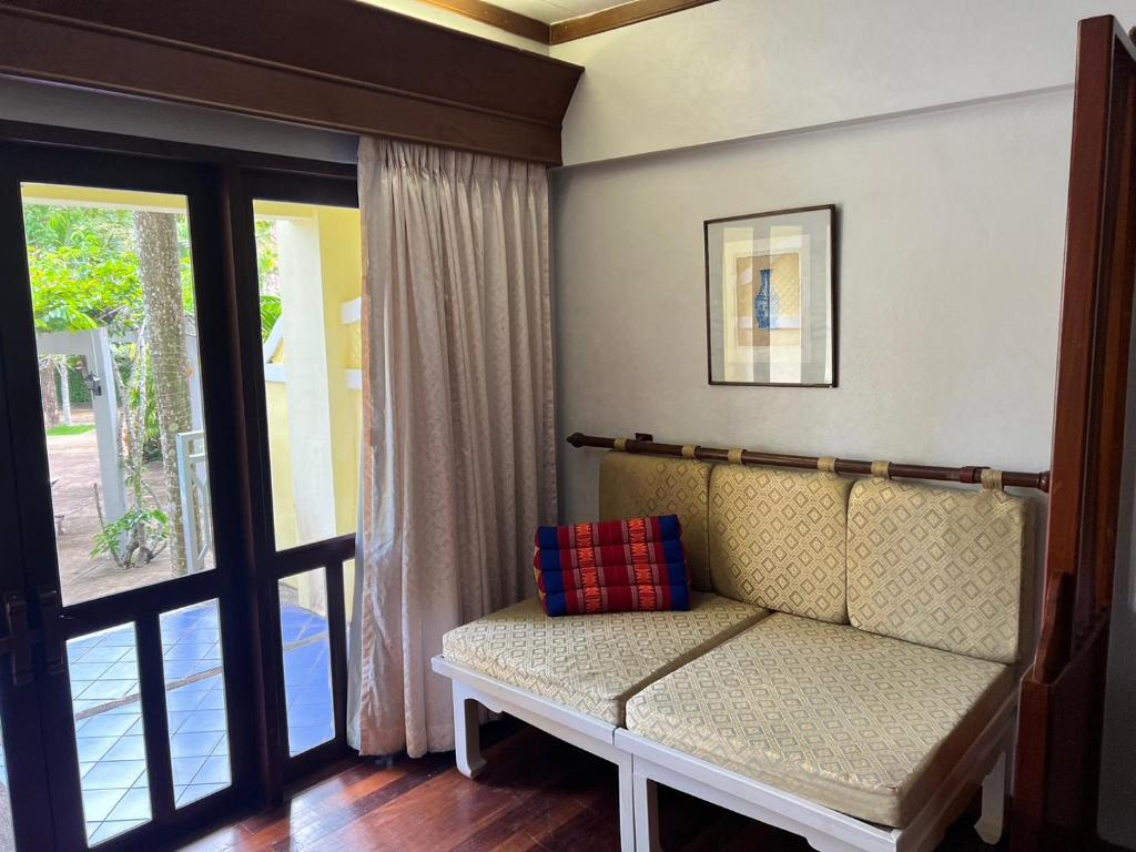 Postel nebo postele na pokoji v ubytování MW Krabi Beach Resort - Ao Nang - SHA Extra Plus