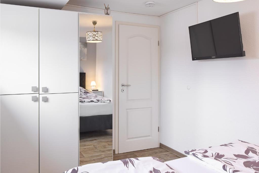 Postel nebo postele na pokoji v ubytování Ferienwohnung Leipzig Süd