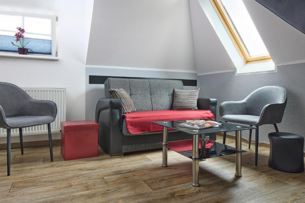 Posezení v ubytování Ferienwohnung Leipzig Süd