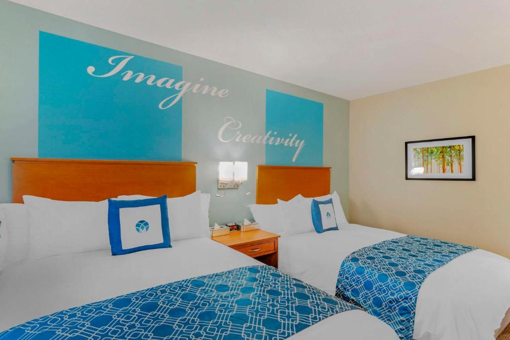 Unity Hotel and Conference Ctr, Ascend Hotel Collection 객실 침대