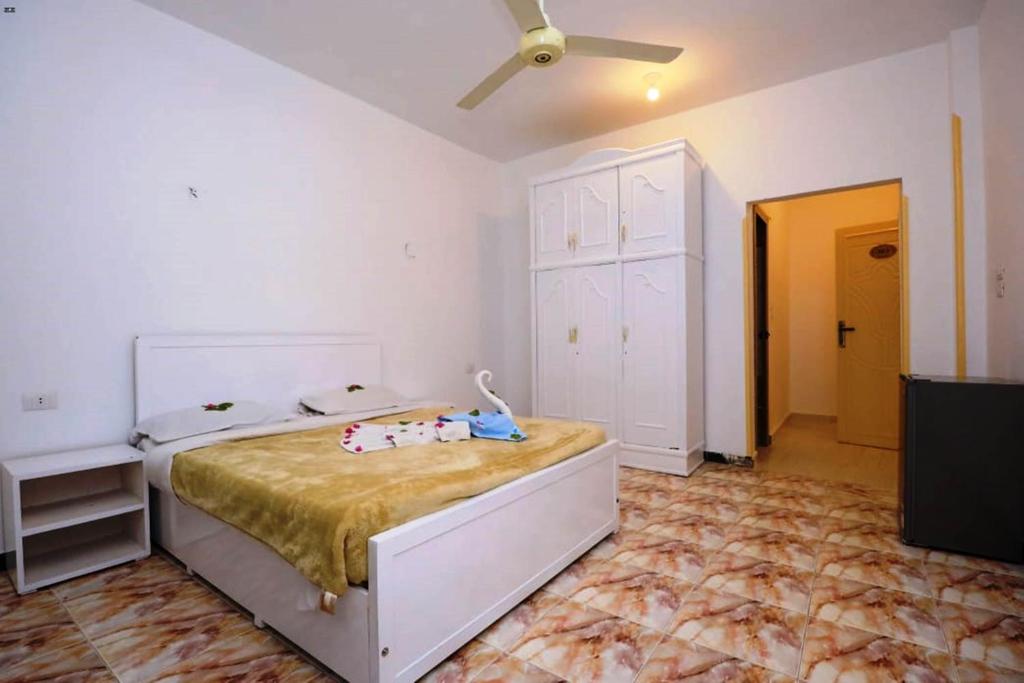 Postel nebo postele na pokoji v ubytování Luxor View Hostel