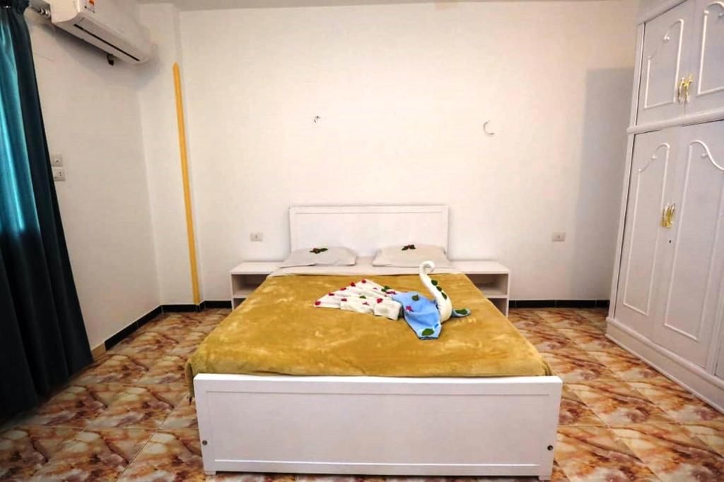 Postel nebo postele na pokoji v ubytování Luxor View Hostel