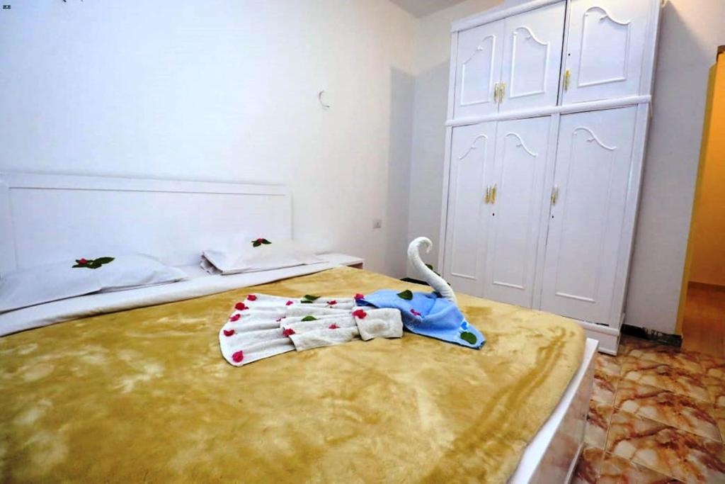 Postel nebo postele na pokoji v ubytování Luxor View Hostel