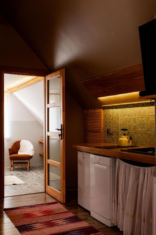 Kuchyňa alebo kuchynka v ubytovaní Apartament nad Potokiem Sauna, Jacuzzi, SPA