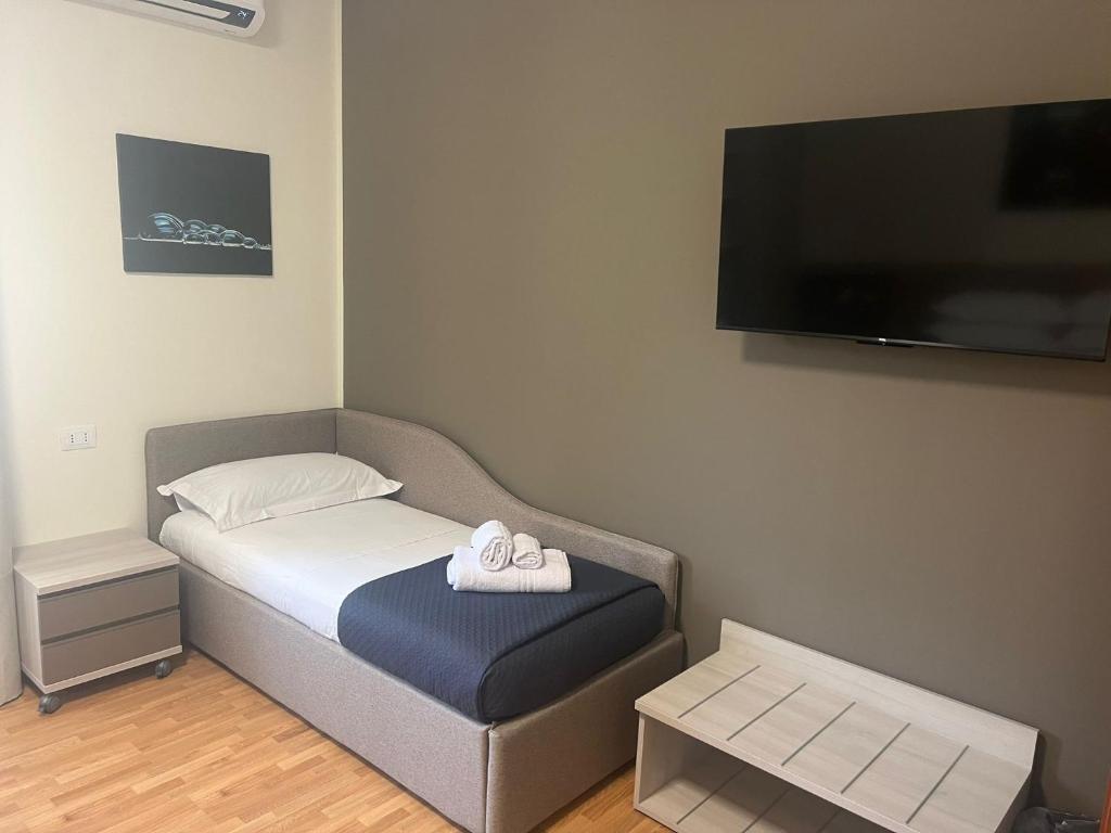 Postel nebo postele na pokoji v ubytování Affittacamere Il Faggio