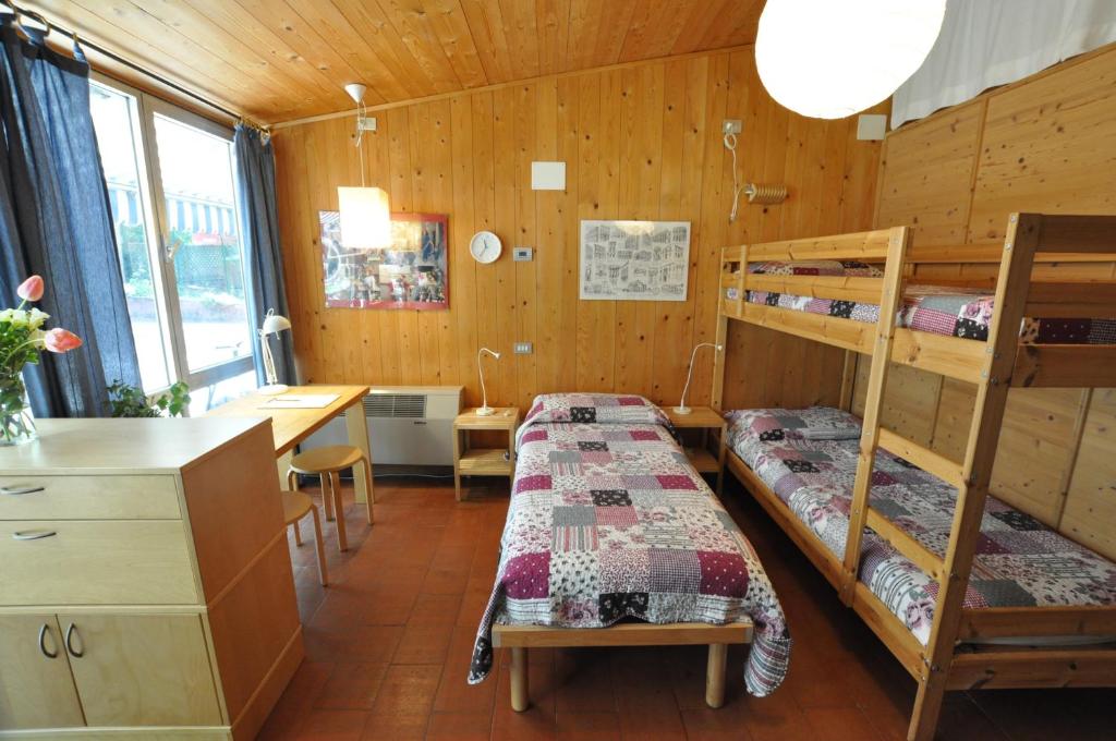 Postel nebo postele na pokoji v ubytování La Casa Trasparente - locazioni brevi