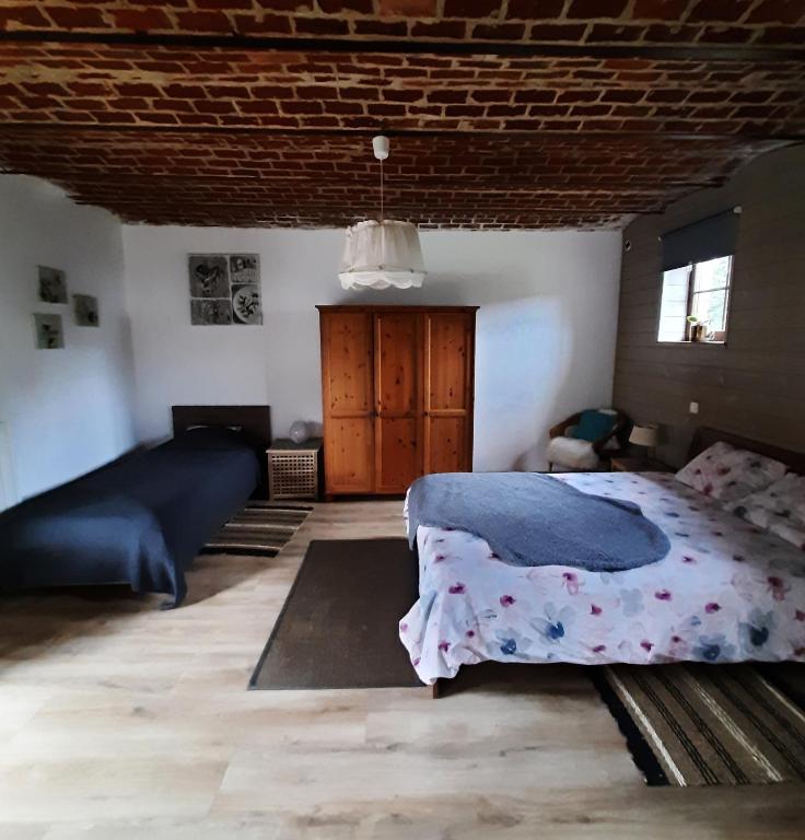 Postel nebo postele na pokoji v ubytování Gîte de l'Espinette