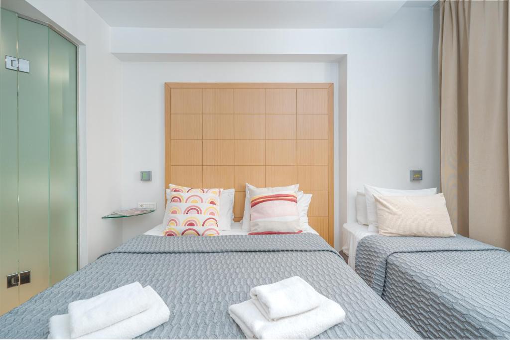 Postel nebo postele na pokoji v ubytování Chic Hotel