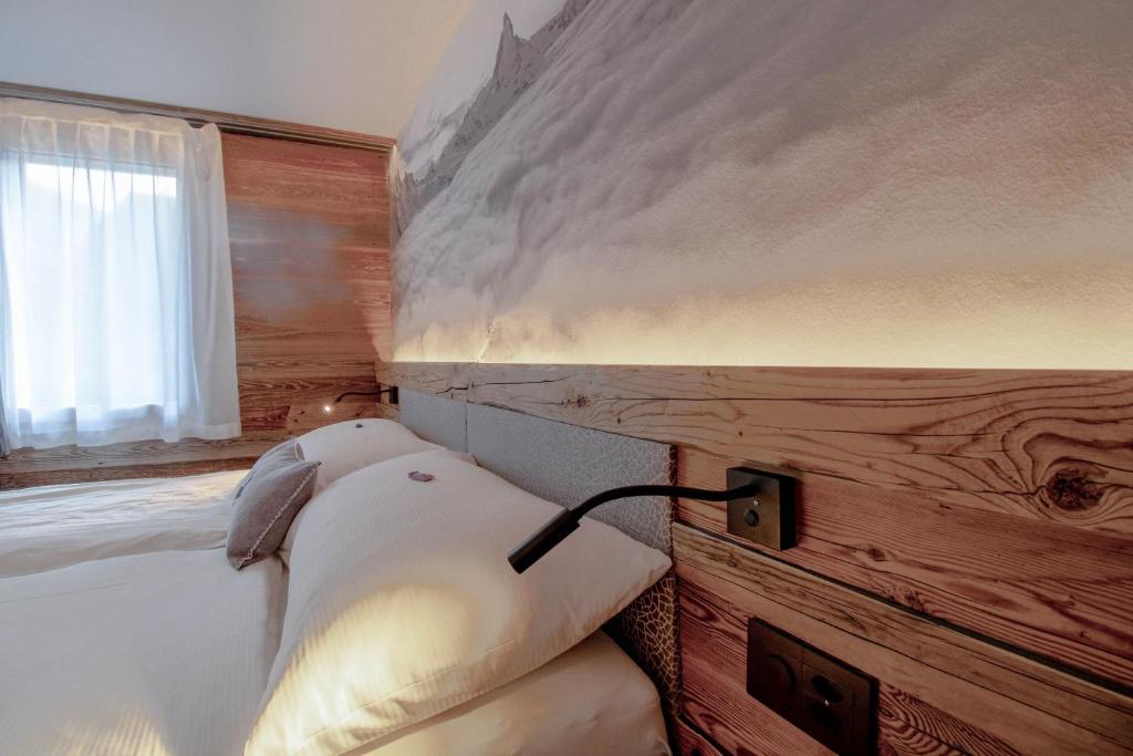 Voodi või voodid majutusasutuse Alpine Lodge toas