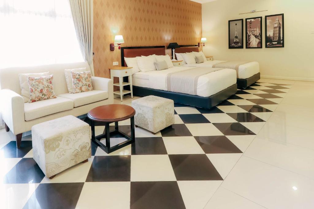 Postel nebo postele na pokoji v ubytování HOME Guesthouse
