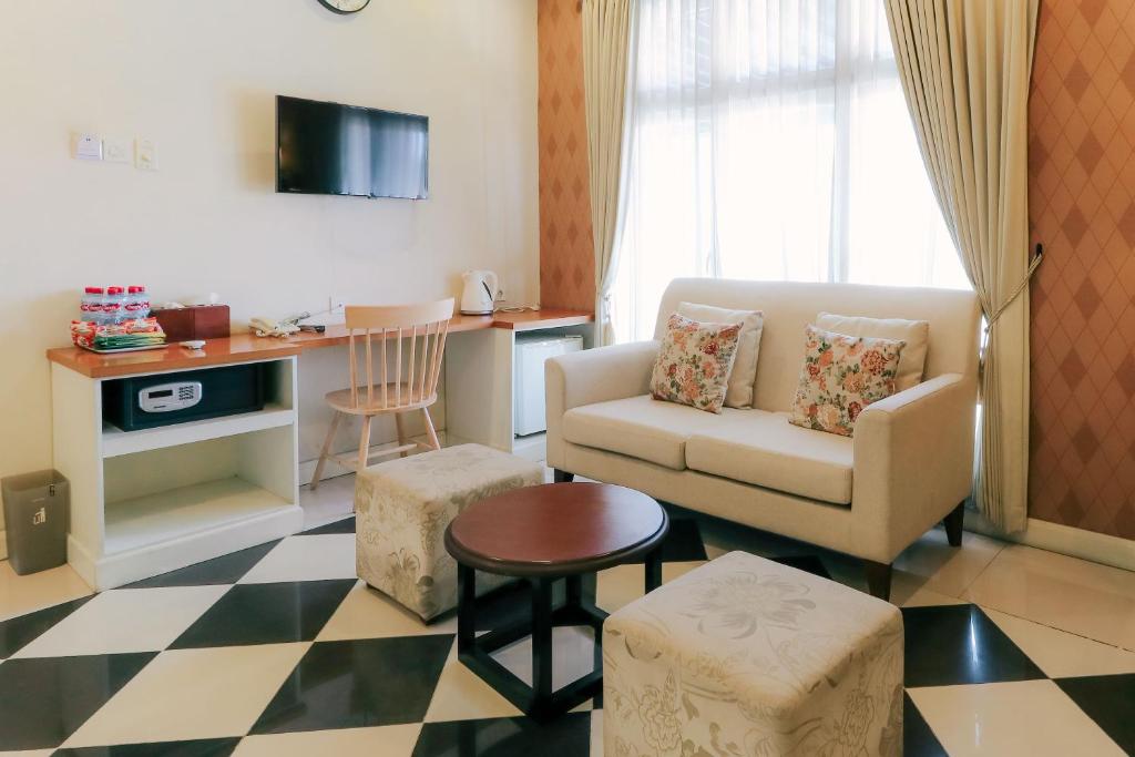 TV a/nebo společenská místnost v ubytování HOME Guesthouse