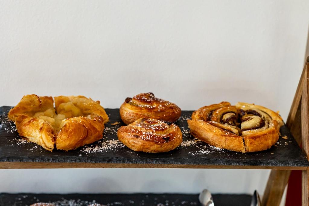 a group of pastries sitting on a tray at Carrick Gate in Carrick