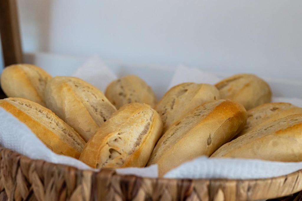 a basket filled with lots of loaves of bread at Carrick Gate in Carrick