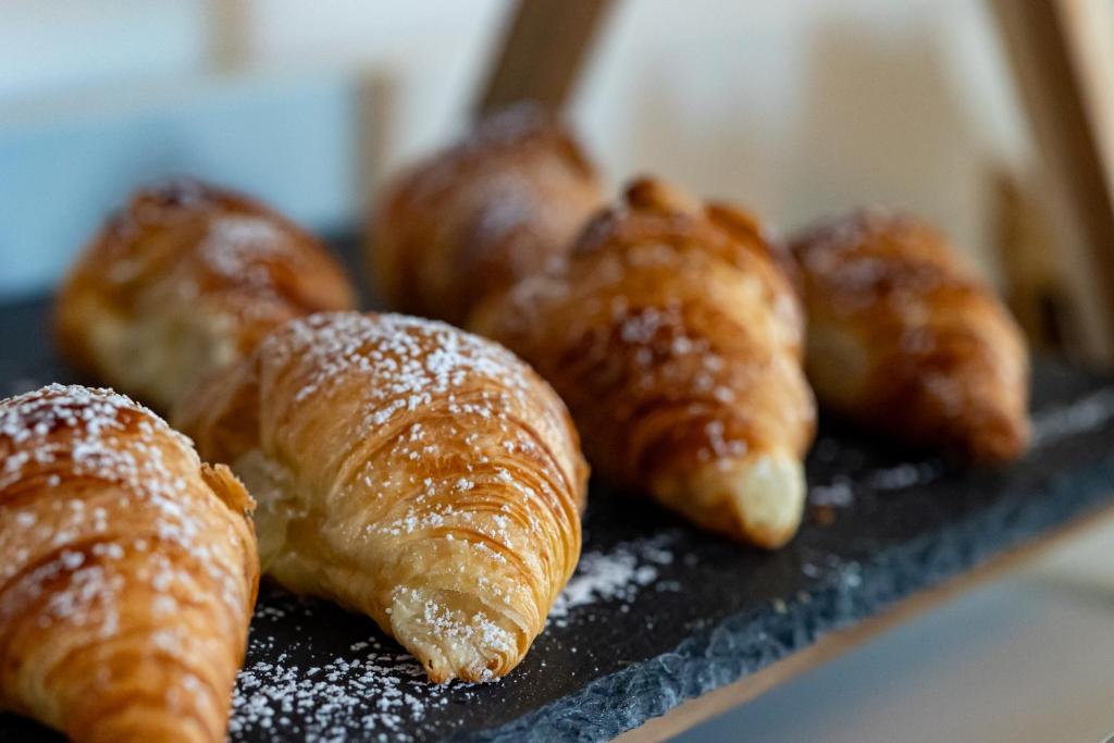 a group of croissants sitting on a tray at Carrick Gate in Carrick