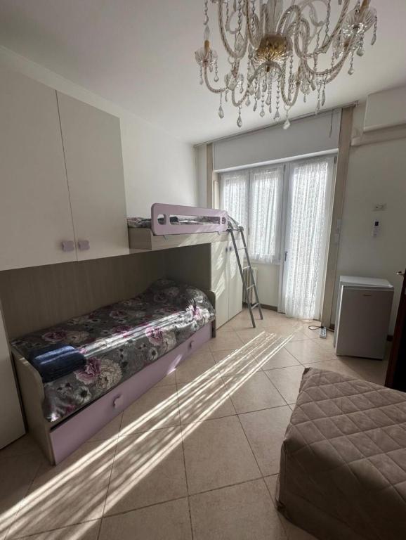 Postel nebo postele na pokoji v ubytování Gigli, rooms con cucina in comune e terrazza