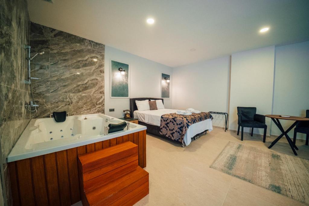 Postel nebo postele na pokoji v ubytování Adresim Sapanca Boutique Hotel