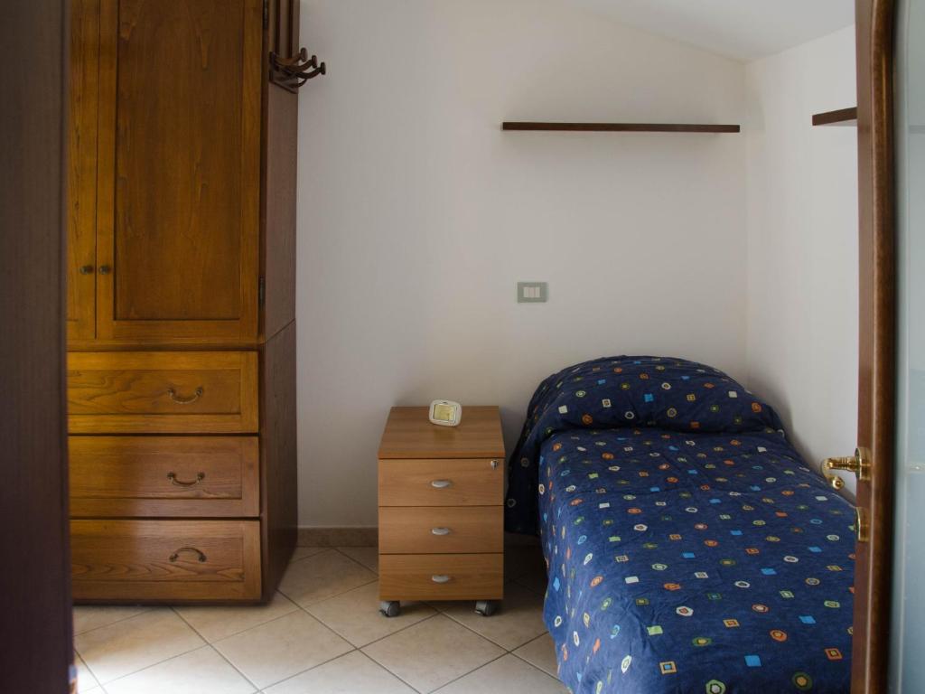 Postel nebo postele na pokoji v ubytování Al Cortile Tranquillo