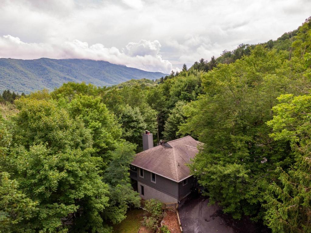an aerial view of a house in the woods at Grand View in Seven Devils
